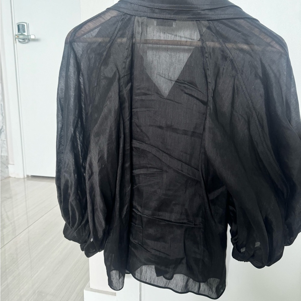 Black long sleeve blouse for sale. Worn only one time